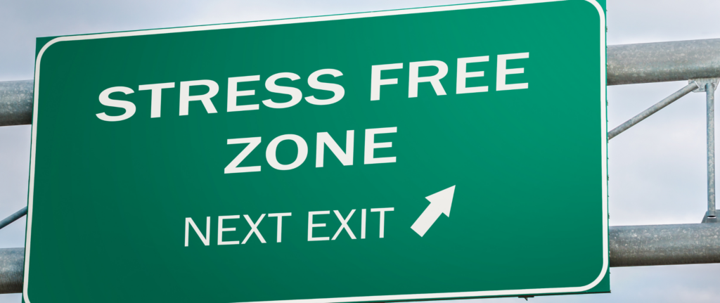 Green highway road sign reading “Stress Free Zone, Next Exit” with a white arrow, symbolizing an easy and hassle-free home selling process.